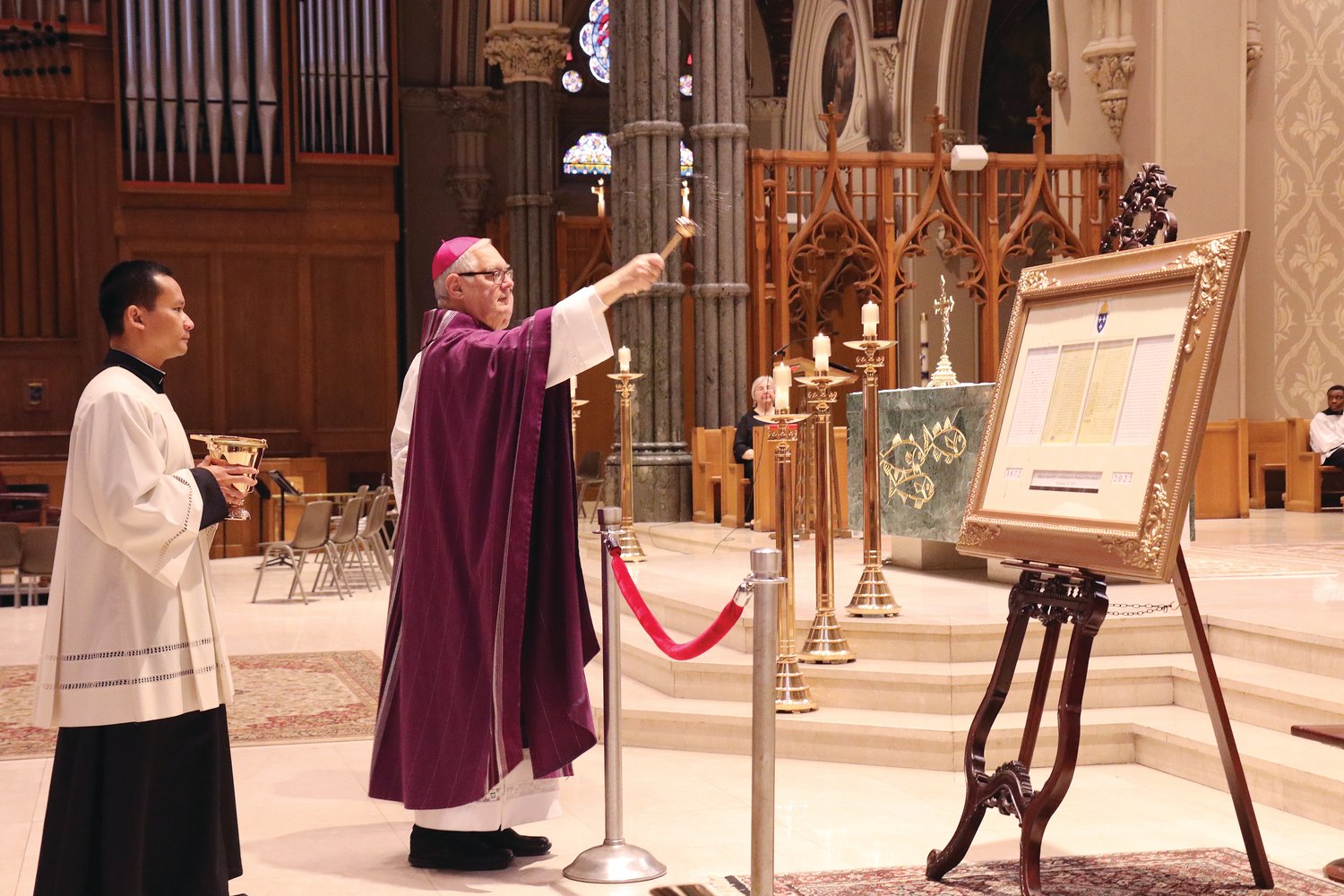 On Sunday, Dec. 5, Bishop Thomas J. Tobin blessed an authentic copy of the papal bull issued by the Holy See on February 16, 1872.